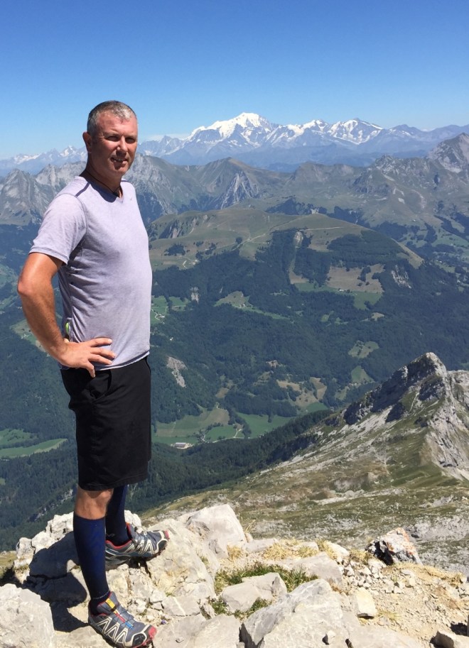 The author enjoys the view of Mt. Blanc from the summit of La Tournette.
